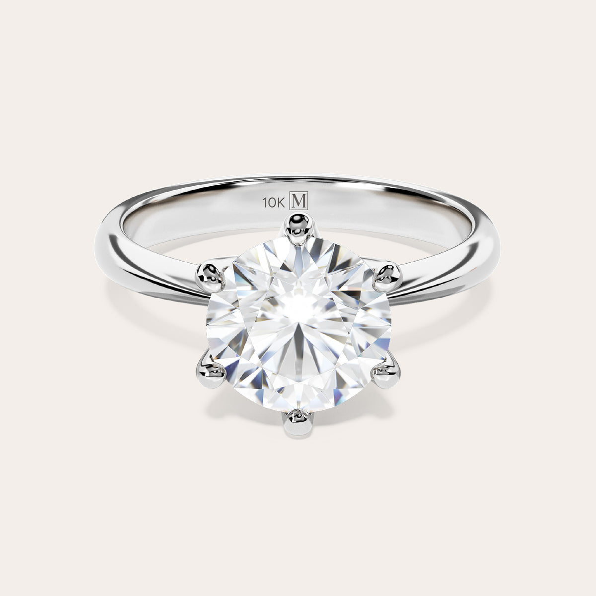 Eterna solitaire ring in 10K white gold, front view with a round brilliant moissanite center stone