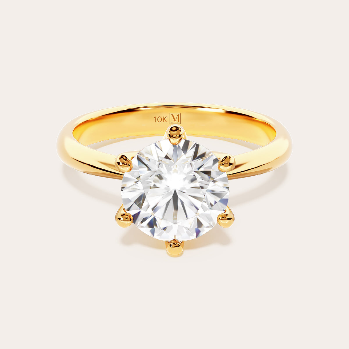 Eterna solitaire ring in 10K yellow gold, front view with a round brilliant moissanite center stone