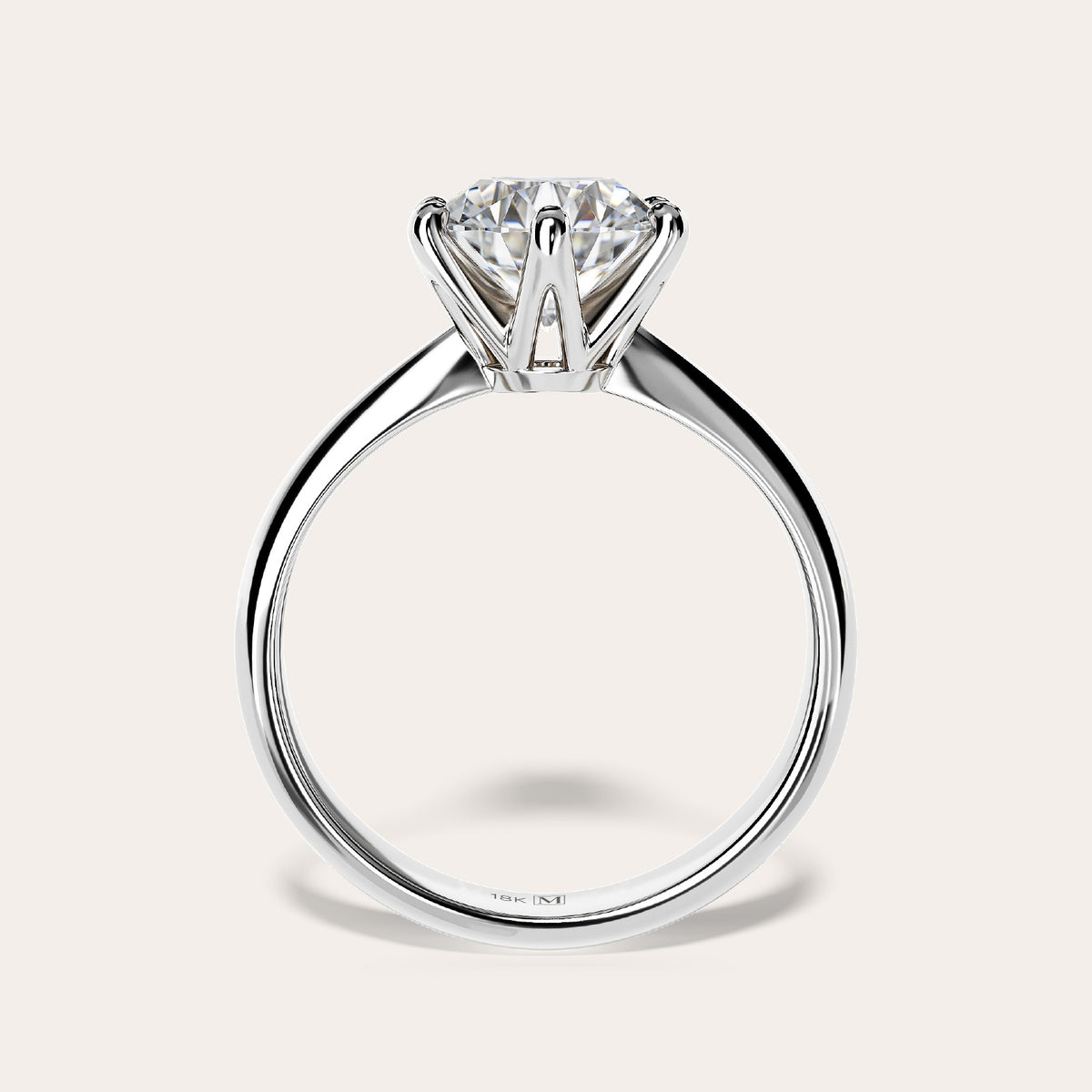 Eterna solitaire ring in 18K white gold with engraved band, side profile showing the six-prong setting